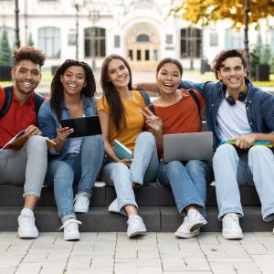 Education Abroad. Group Of International Students Posing Outdoors